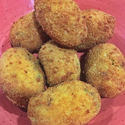 Comer croquetas en Padrón